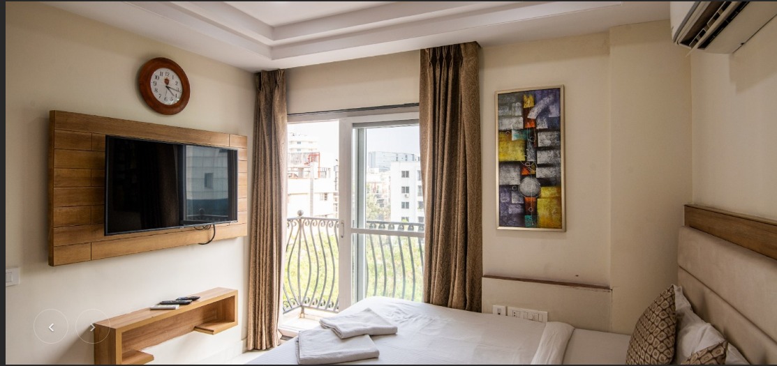 Deluxe Balcony Room with Hyderabad skyline view